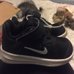 Baby Nike’s, Black & white.